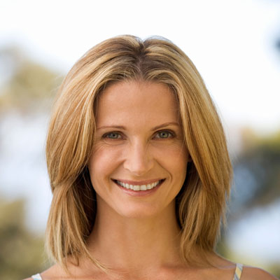 smiling-woman-with-blonde-hair-outside-2026-03-26-08-14-20-utc